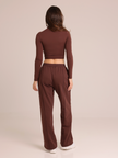 AIRE brown lounge long-sleeve set displayed on a mannequin, showcasing a relaxed fit and comfortable fabric.